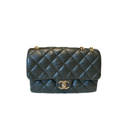 Chanel 22K Mini Flap bag in dark emerald green lambskin featuring the adjustable gold ball chain buckle and CC logo
