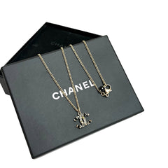 Chanel Classic Interlocking CC Necklace - Gold Tone Textured Pendant (Black Bead Detail)