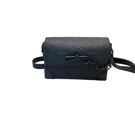 Authentic Louis Vuitton Steamer Wearable Wallet in black embossed Monogram Taurillon leather with matte black chain and safety pin closure