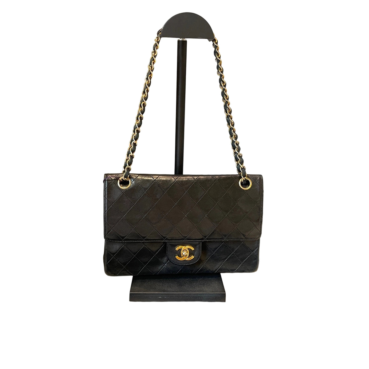 Timeless Vintage Icon: CHANEL Black & Gold CF Chain Bag
