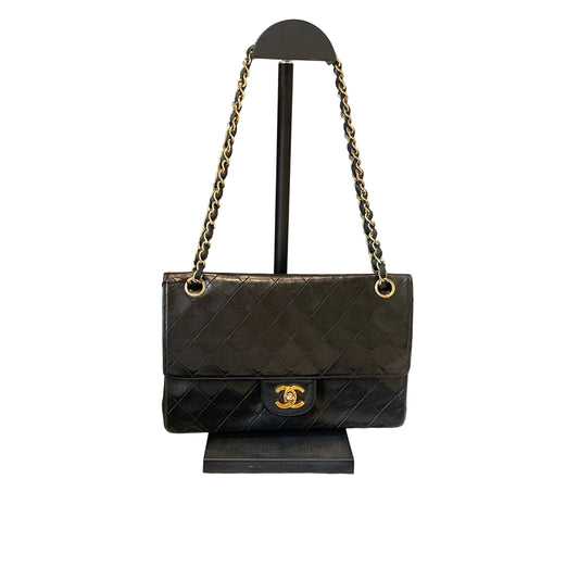 Timeless Vintage Icon: CHANEL Black & Gold CF Chain Bag