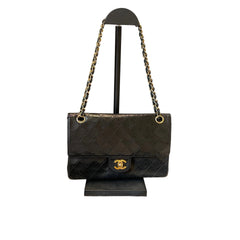 Timeless Vintage Icon: CHANEL Black & Gold CF Chain Bag