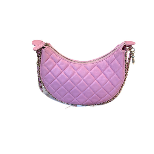Front view of the Chanel 23P Moon bag in sakura pink quilted lambskin with gold chain detailing and latest microchip technology