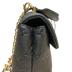 Louis Vuitton Madeleine Nano Handbag - Black Monogram Empreinte Leather with Gold Chain