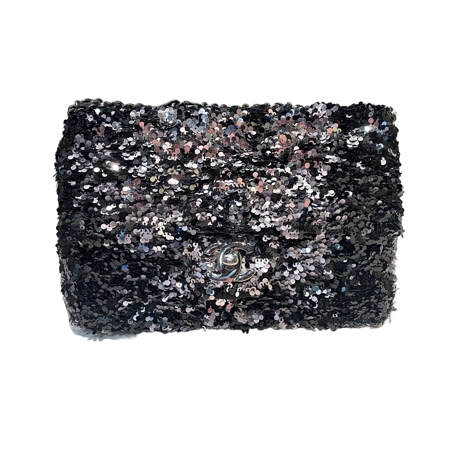 Front view of Chanel Mini Flap bag featuring black and silver sequins on tweed fabric with silver CC turn-lock hardware and chain strap.