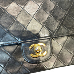 Timeless Vintage Icon: CHANEL Black & Gold CF Chain Bag