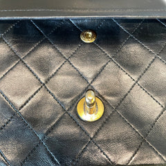 Timeless Vintage Icon: CHANEL Black & Gold CF Chain Bag