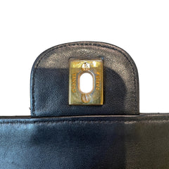 Timeless Vintage Icon: CHANEL Black & Gold CF Chain Bag