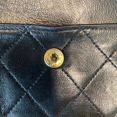 Timeless Vintage Icon: CHANEL Black & Gold CF Chain Bag