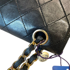 Timeless Vintage Icon: CHANEL Black & Gold CF Chain Bag