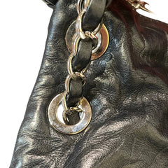 Vintage Attitude Classic: CHANEL Black Waxed Leather Airport CF Bag
