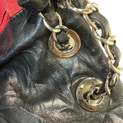 Vintage Attitude Classic: CHANEL Black Waxed Leather Airport CF Bag