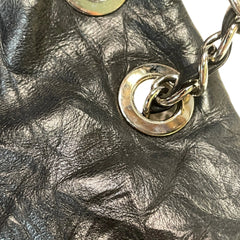 Vintage Attitude Classic: CHANEL Black Waxed Leather Airport CF Bag