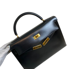 Enduring Icon: Hermès Kelly 32 in Black Box Leather with Gold Hardware