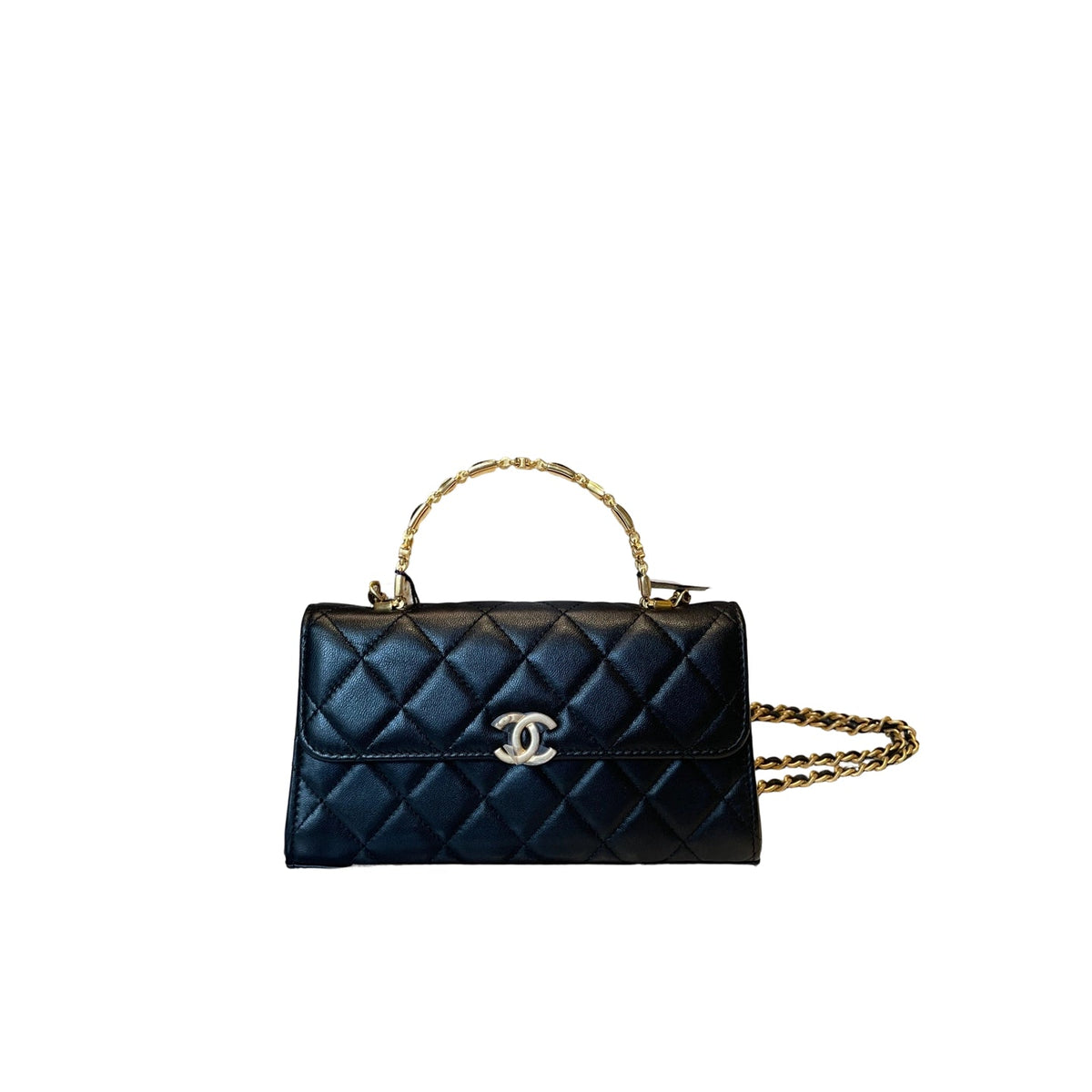 Chanel 22B Black Lambskin Mini Flap Bag with a unique gold and enamel decorative top handle and CC turn-lock