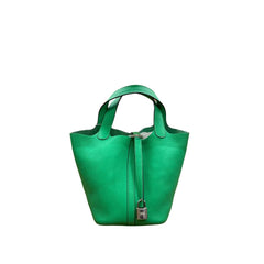 Authentic Hermès Picotin Lock 18 bag in vibrant Vert Comics green Taurillon Clemence leather with silver-tone Palladium hardware