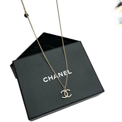 Chanel Classic Interlocking CC Necklace - Gold Tone Textured Pendant (Black Bead Detail)