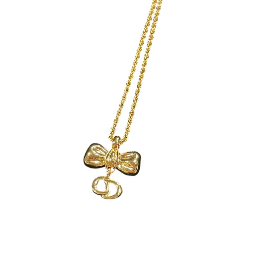 Christian Dior Vintage Bow Necklace - Gold Tone with Dangling CD Charm