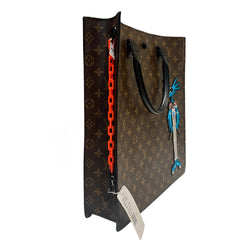 Runway-Level Statement: Louis Vuitton Embroidered Doll Monogram Music Bag