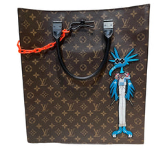 Runway-Level Statement: Louis Vuitton Embroidered Doll Monogram Music Bag