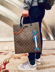 Runway-Level Statement: Louis Vuitton Embroidered Doll Monogram Music Bag