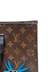 Runway-Level Statement: Louis Vuitton Embroidered Doll Monogram Music Bag