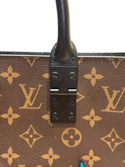 Runway-Level Statement: Louis Vuitton Embroidered Doll Monogram Music Bag