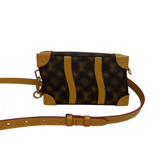 Louis Vuitton Soft Trunk Wallet featuring distorted wavy Monogram canvas and wavy yellow leather straps. Boxy shape with trunk-inspired corners and red edge glazing.