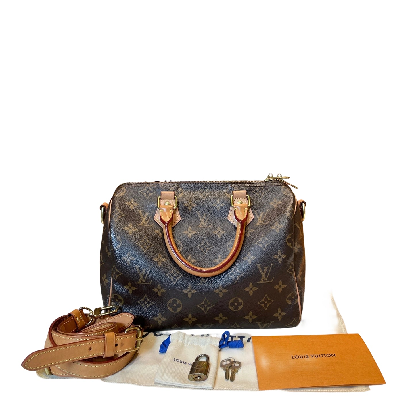Louis Vuitton Speedy Bandoulière 25 Monogram canvas bag with removable leather strap, padlock, keys and dustbag, front view