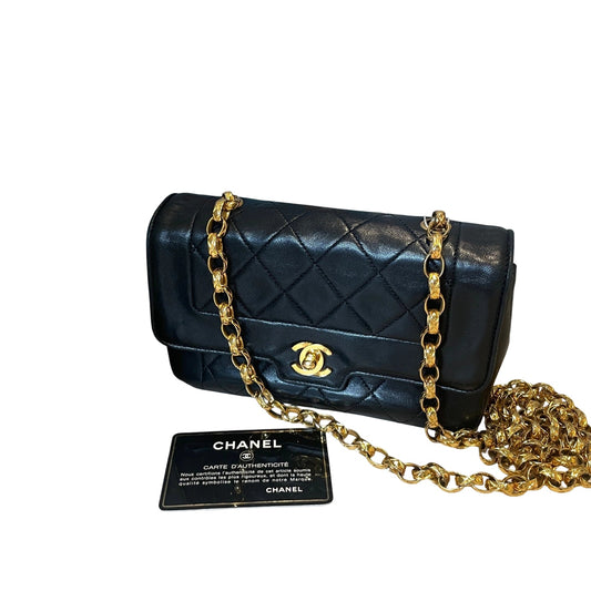 Vintage Chanel Mini Rectangular Flap bag in black quilted lambskin with rare chunky 24K gold-plated chain and CC turn-lock