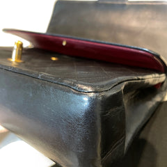 Timeless Vintage Icon: CHANEL Black & Gold CF Chain Bag