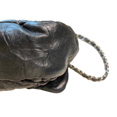 Vintage Attitude Classic: CHANEL Black Waxed Leather Airport CF Bag