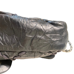 Vintage Attitude Classic: CHANEL Black Waxed Leather Airport CF Bag